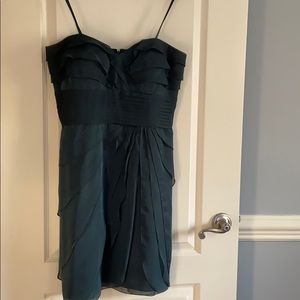 Adriana Papel strapless dress in emerald green.